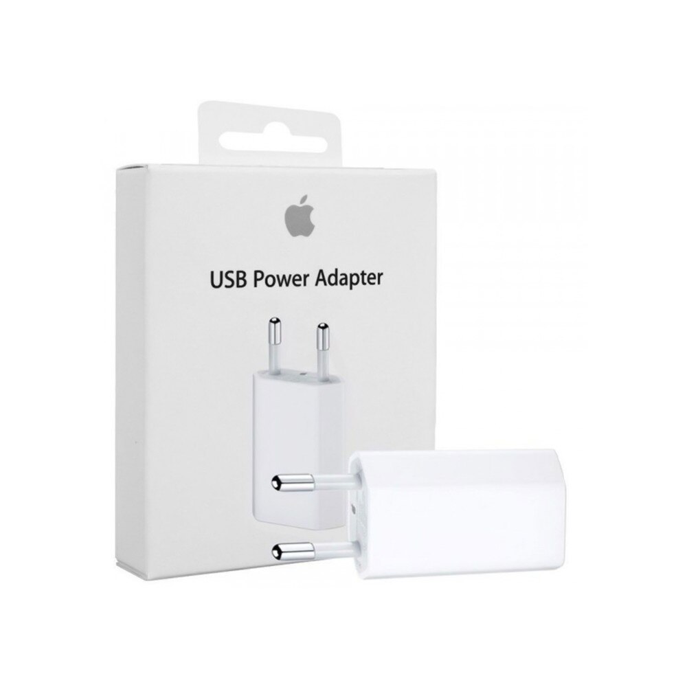 En vit USB-strömadapter med två runda stift visas framför sin förpackningslåda, som visar Apple-logotypen och texten "USB Power Adapter". En vit USB-strömadapter med två runda stift visas framför sin förpackningslåda, som visar Apple-logotypen och texten "USB Power Adapter".